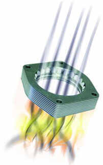 Drawing of air passing through an aFe throttle body spacer
