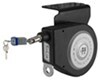Lippert ToyLok stake pocket mounted retractable cable lock.