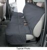 Canine Covers seat protector in rear seat of vehicle. 