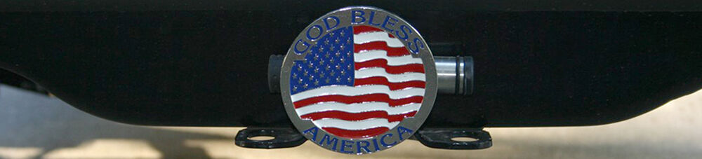 Hitch cover featuring American flag and the phrase "God Bless America".