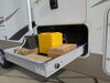 MOrryde RV cargo sliding tray extended out of RV holding leveling blocks.
