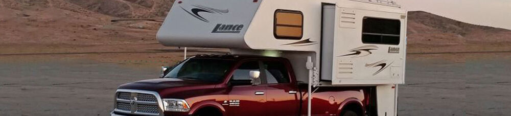 truck with truck bed camper. 