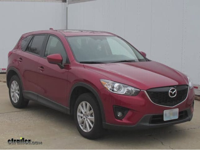 https://www.etrailer.com/static/images/faq/install-trailer-wiring-harness-2013-mazda-cx5-c56011_644.jpg