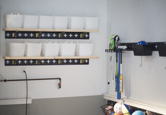 E-Track on Wall Supporting Shelf with Baskets