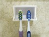 Camco pop-a-toothbrush holder.