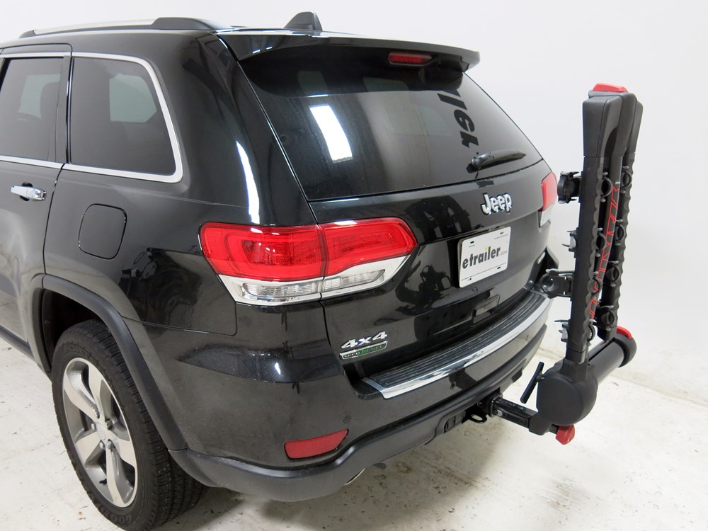 2015 Jeep Grand Cherokee Yakima FullSwing 4 Bike Rack 2