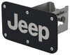 Au-Tomotive Gold Jeep logo trailer hitch cover.