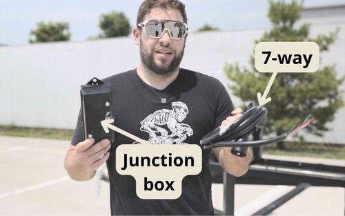 AJ holding 7-Way wire and junction box