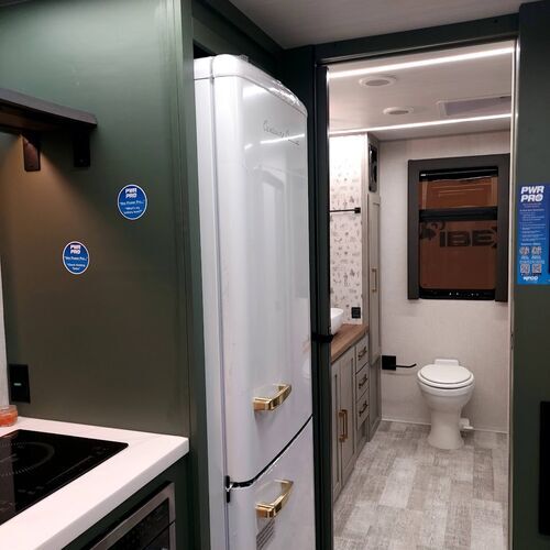 Green Wall and Gold Hardware on Fridge