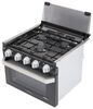 Furrion 2-in-1 black RV range oven with glass cover.