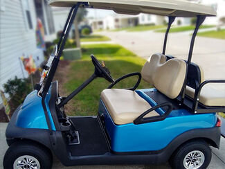 Power Sonic Lithium Ion battery for golf carts. Black outer casing with handle on top.