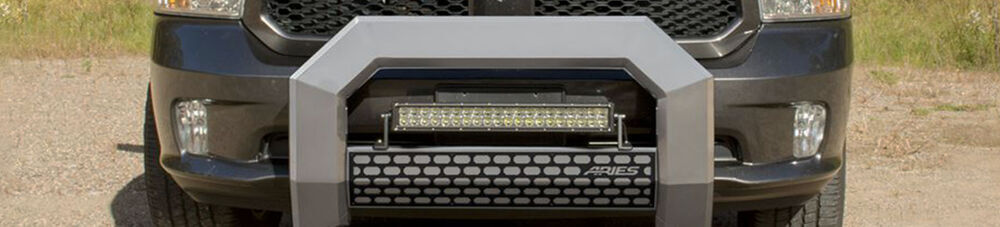 Aries Automotive grille guard with light bar.