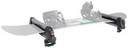 Malone Liftline Ski and Snowboard Carrier holding snowboard.