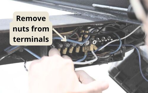 Remove nuts from terminals on junction box