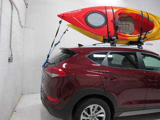 Kayaks strapped to Vehicle Roof