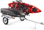 Yakima Rack and Roll trailer carrying a roof box, two bikes, and a kayak.