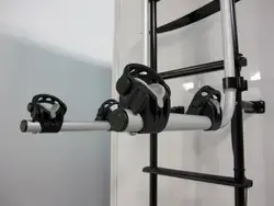 Closeup of ladder-mounted RV bike rack