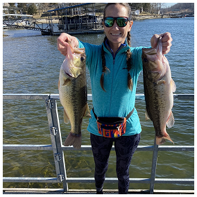 Kate holding fish. 
