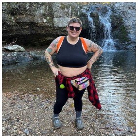 Lauren on a river bank. 