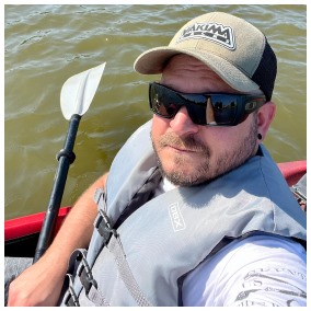 Tommy kayaking.