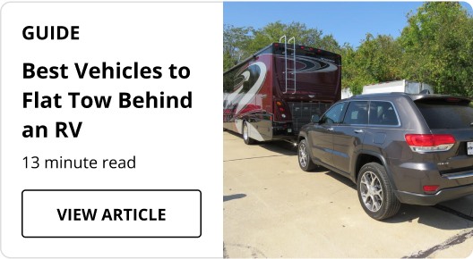 Best Vehicles to flat tow article with red rv towing gray suv. 