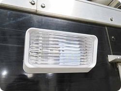 Eclipse LED RV Security Light with a white base. 