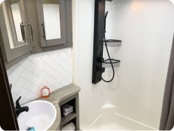 Rv bathroom toliet and trash can. 
