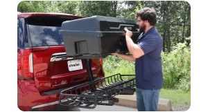 Man install yakima exo on suv. 