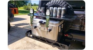 RucRack Spare tire carrier on back of jeep.